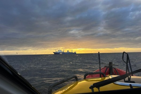 Fishing trawler and NSRI boat en route