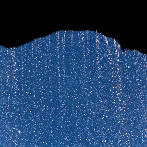 silhouette of rock formation with rain droplets