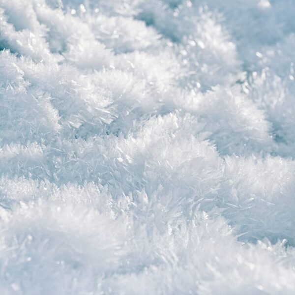 white snow on blue background